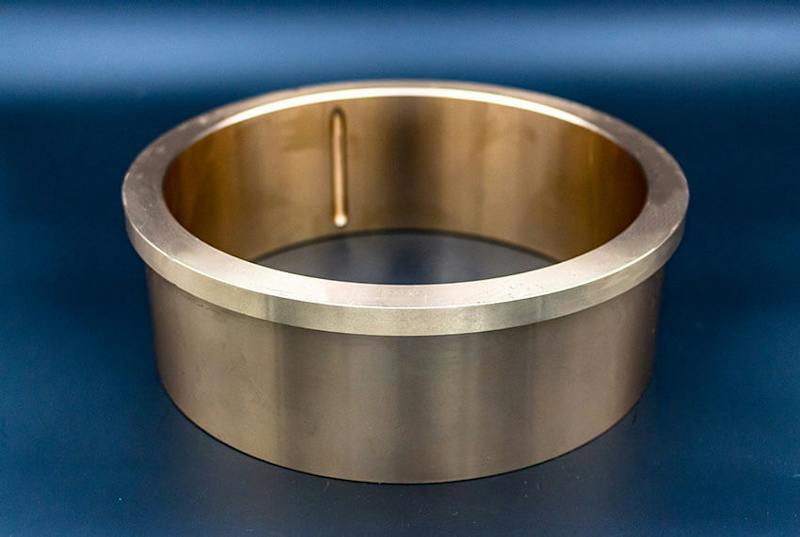 Gleitlager Rohr WPK7-Serie: Massive Gleitlager aus Bronze mit Schmiernuten | wlw.at